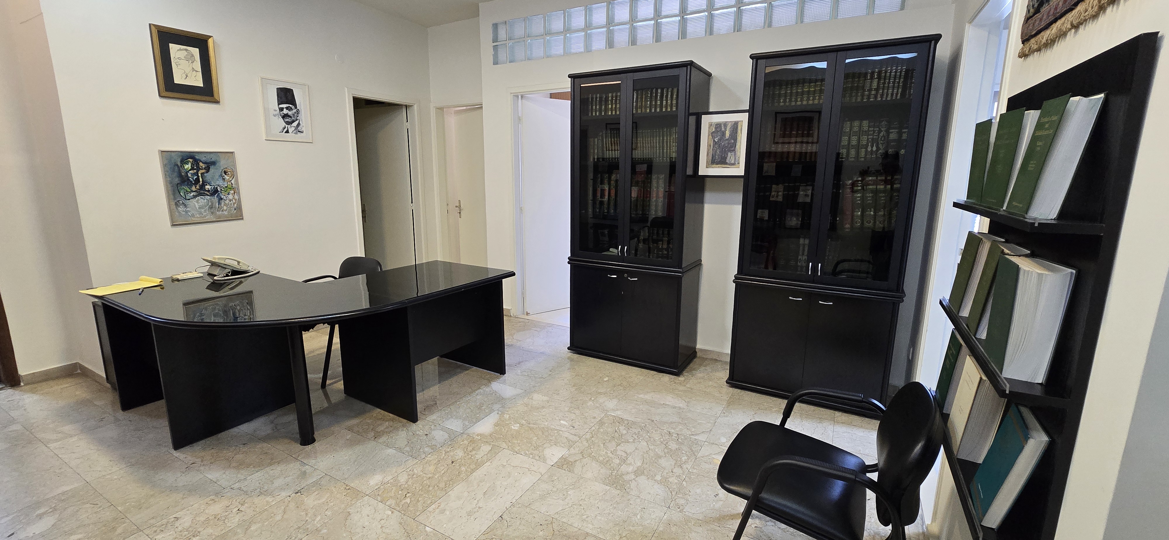 Front office with law library cabinets